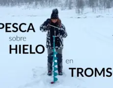 Descubre la experiencia única de practicar pesca en hielo en los impresionantes lagos congelados de Noruega
